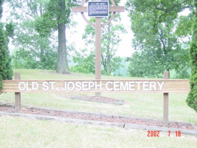 Picture of the Old St Joseph sign and Cross